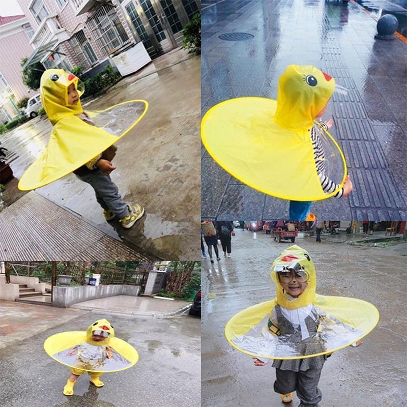 Blaudonau- Kleine gelbe Ente UFO-Regenmantel